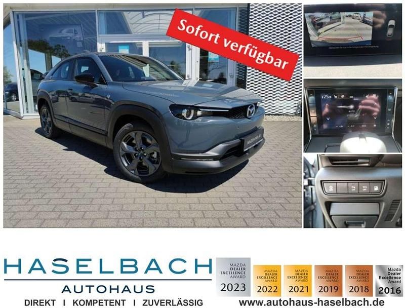 Polymetal grey Gebraucht 2024 Mazda MX30 Exclusive SUV | 28.710 € (Fairer Preis) - Bild 1/4