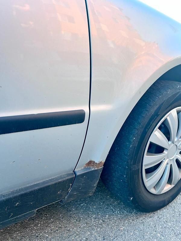 Second-hand VW Passat 102 CP (75 kW) 2004 Gri Break