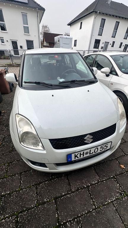 Weiß Gebraucht 2009 Suzuki Swift Limousine | 3.370 € (Fairer Preis) - Bild 1/4