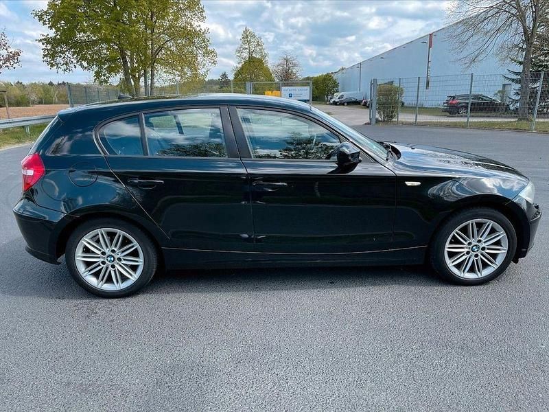 Second-hand BMW 116 116 CP (85 kW) 2011 Negru Hatchback