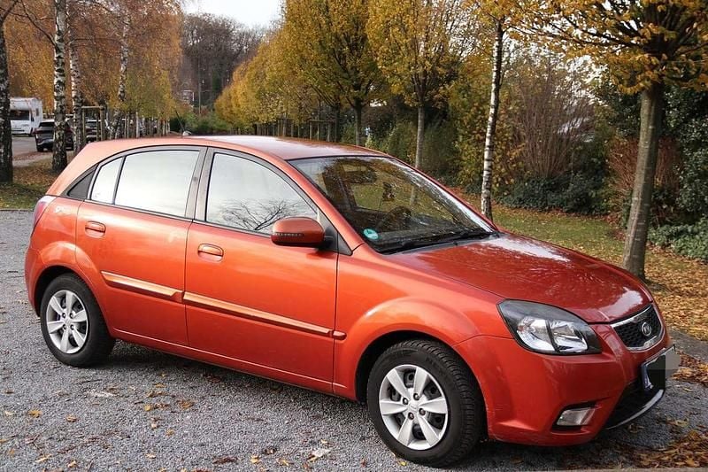 Gebraucht Kia Rio 98 PS (72 kW) 2010 Orange Kleinwagen