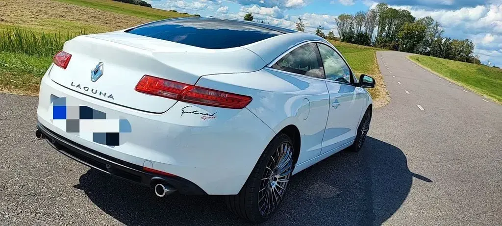 Gebraucht Renault Laguna III 173 PS (127 kW) 2012 Weiß Coupé