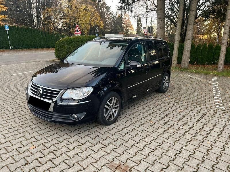 Gebraucht VW Touran Highline 105 PS (77 kW) 2008 Schwarz Van / Kleinbus