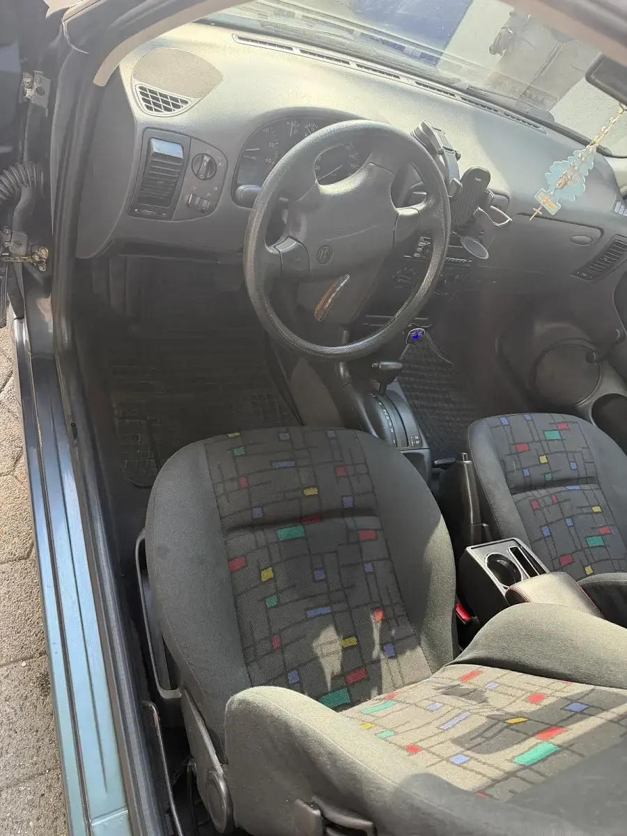 Second-hand VW Polo 100 CP (73 kW) 1999 Gri Hatchback
