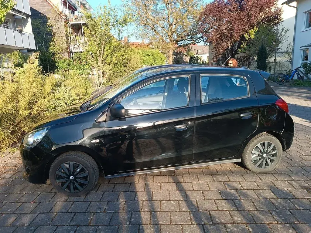 Gebraucht Mitsubishi Space Star Diamant Edition 71 PS (52 kW) 2014 Schwarz Van / Kleinbus