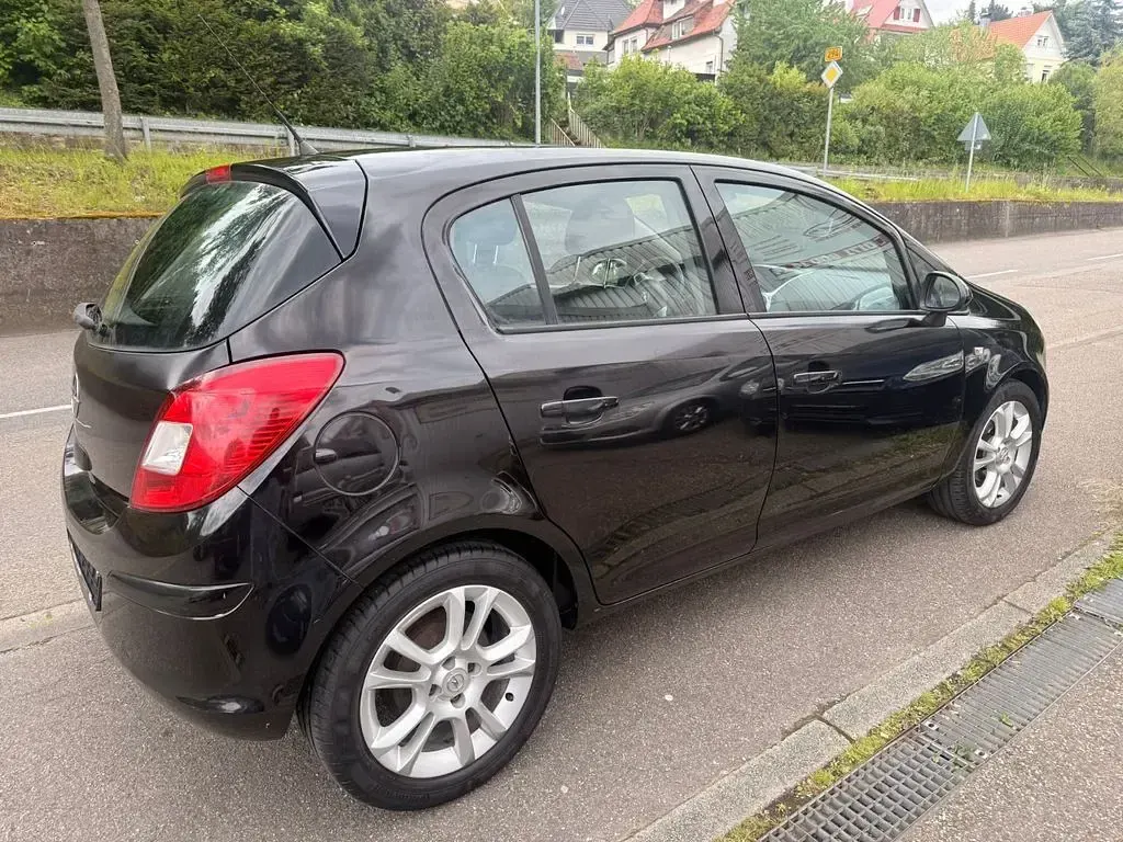 Używany Opel Corsa Cosmo 80 KM (58 kW) 2008 Czarny Hatchback