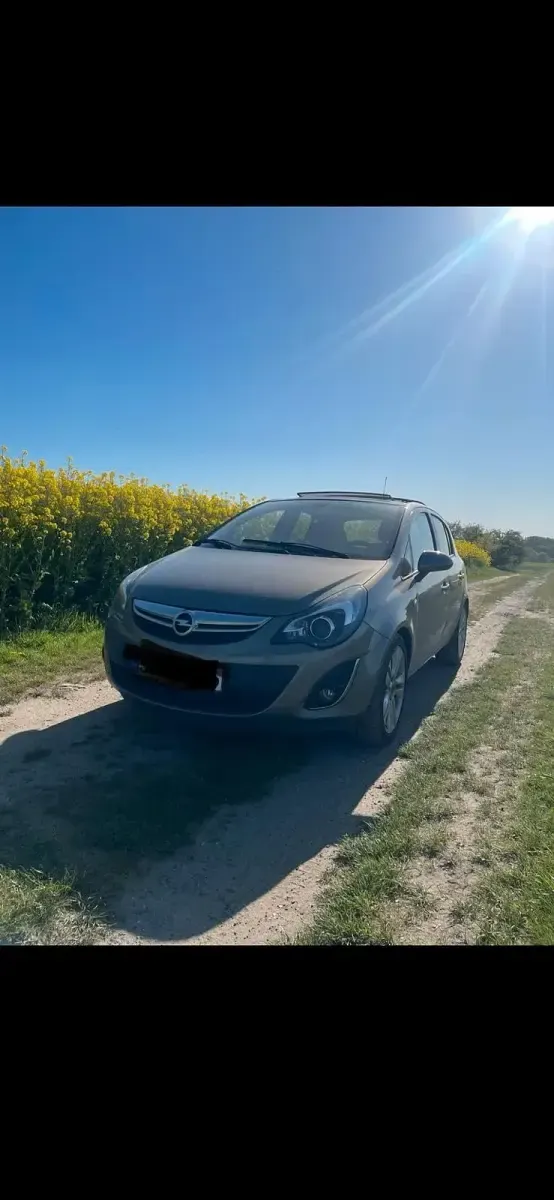 Gebraucht Opel Corsa 101 PS (74 kW) 2014 Gold Kleinwagen