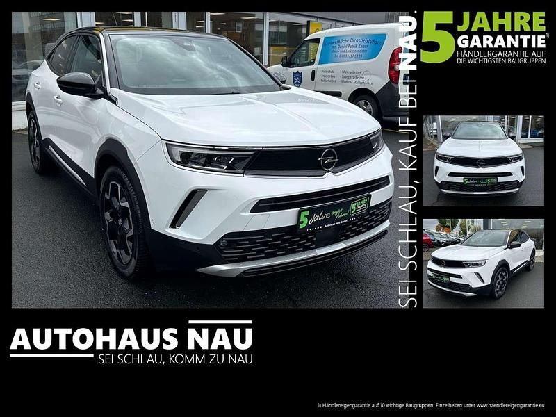 Jade weiss/arktis weiss Gebraucht 2022 Opel Mokka-e Ultimate SUV | 19.990 € (Fairer Preis) - Bild 1/4