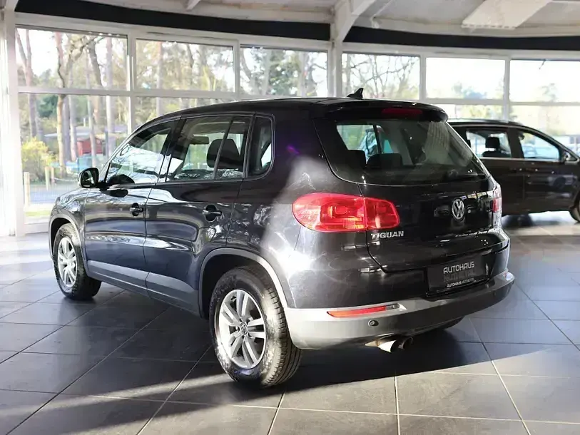 Second-hand VW Tiguan Trendline 122 CP (89 kW) 2014 Negru SUV