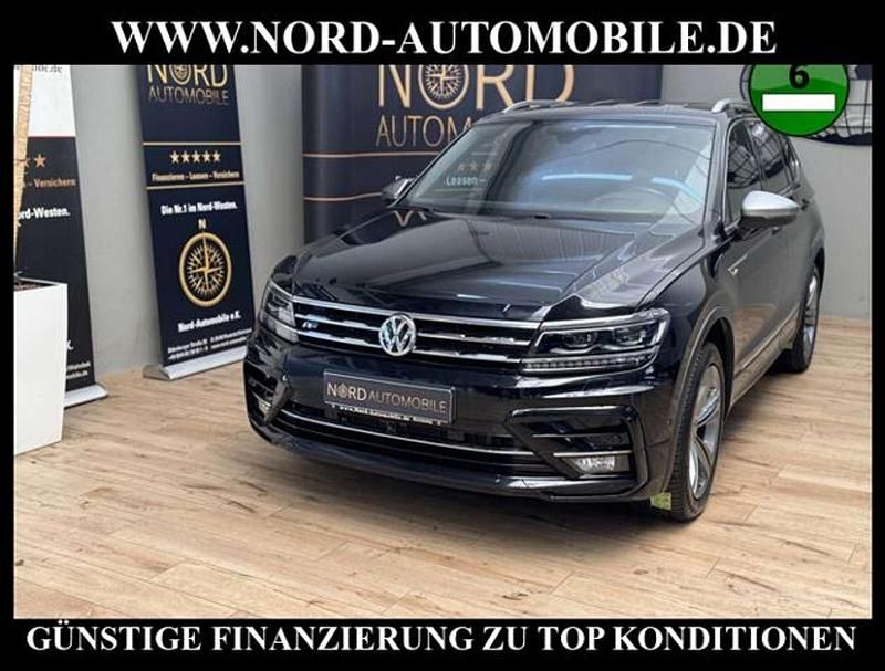 Deep black perleffek (metallic) Gebraucht 2020 VW Tiguan Allspace R-line SUV | 27.799 € (Etwas zu teuer) - Bild 1/3