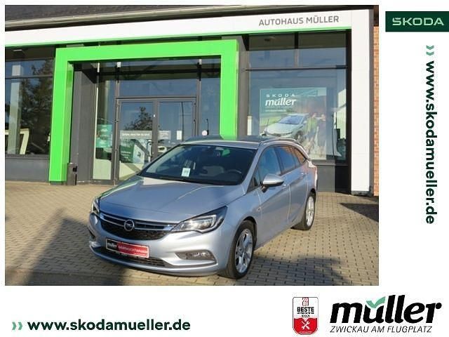 Silber (flip chip/magnetic silver) Gebraucht 2018 Opel Astra Kombi | 13.590 € (Fairer Preis) - Bild 1/4