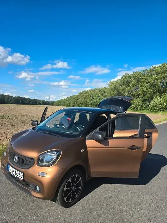 Gebraucht Smart ForFour Passion 71 PS (52 kW) 2015 Braun Kleinwagen