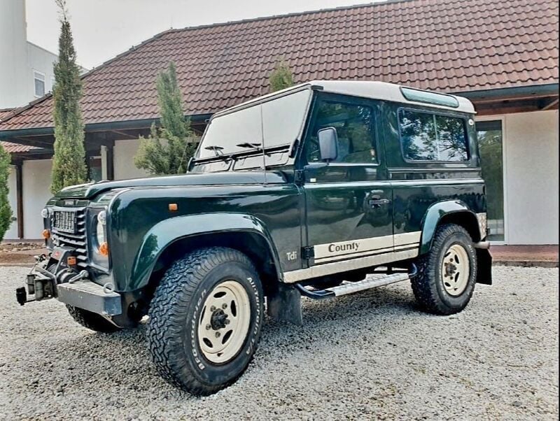 Epson green Gebraucht 1997 Land Rover Defender SUV | 26.990 € (Guter Preis) - Bild 1/4