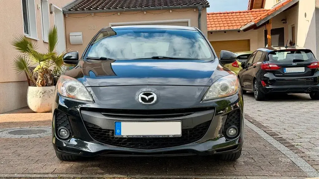 Używany Mazda 3 Edition 150 KM (110 kW) 2012 Czarny Sedan/Limuzyna