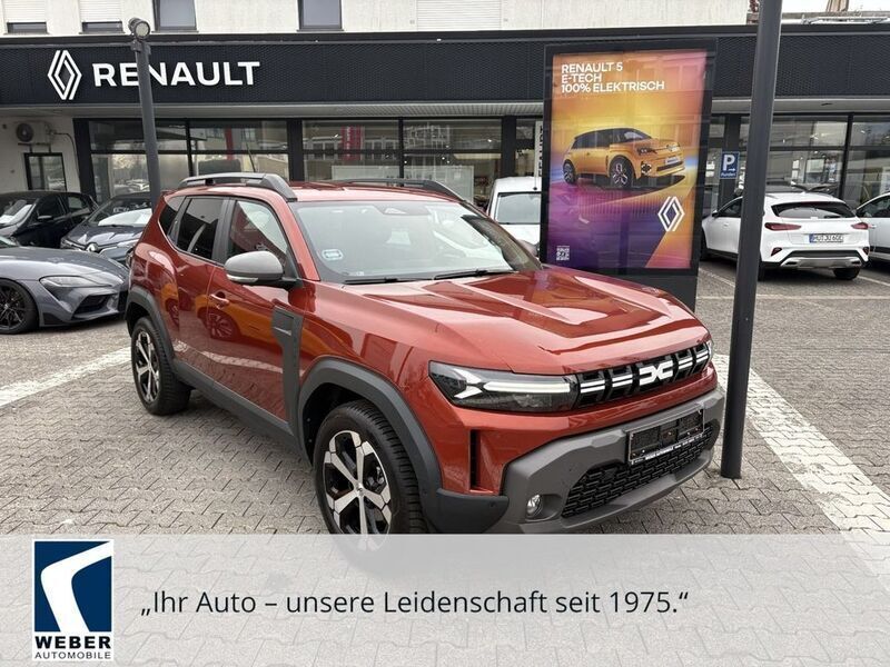 Braun Gebraucht 2024 Dacia Duster Journey SUV | 28.970 € (Fairer Preis) - Bild 1/4