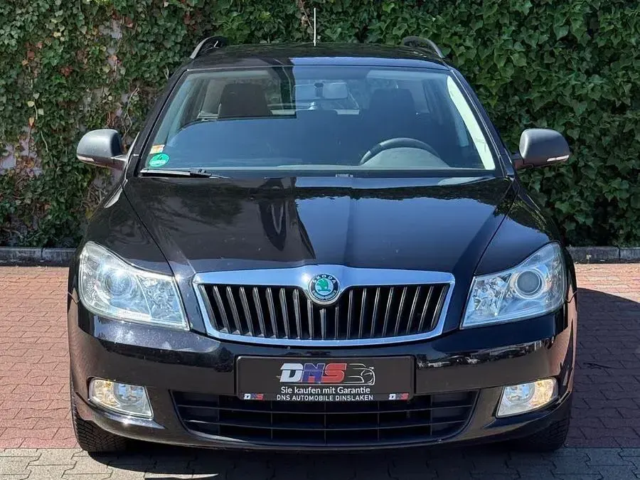 Gebraucht Skoda Octavia Fun 105 PS (77 kW) 2013 Schwarzmagic perleffekt Kombi