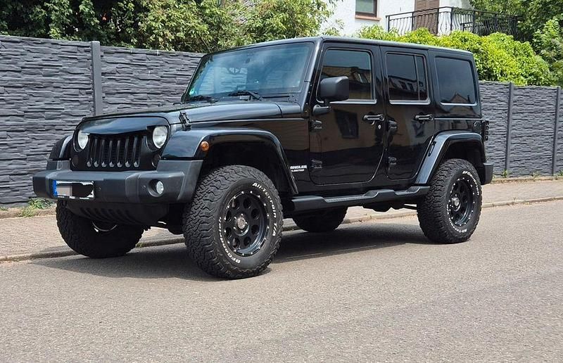 Schwarz Gebraucht 2012 Jeep Wrangler Unlimited SUV | 22.900 € (Fairer Preis) - Bild 1/4