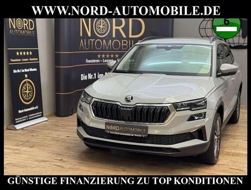 Steelgrau Gebraucht 2022 Skoda Karoq Ambition SUV | 24.900 € (Fairer Preis) - Bild 1/3