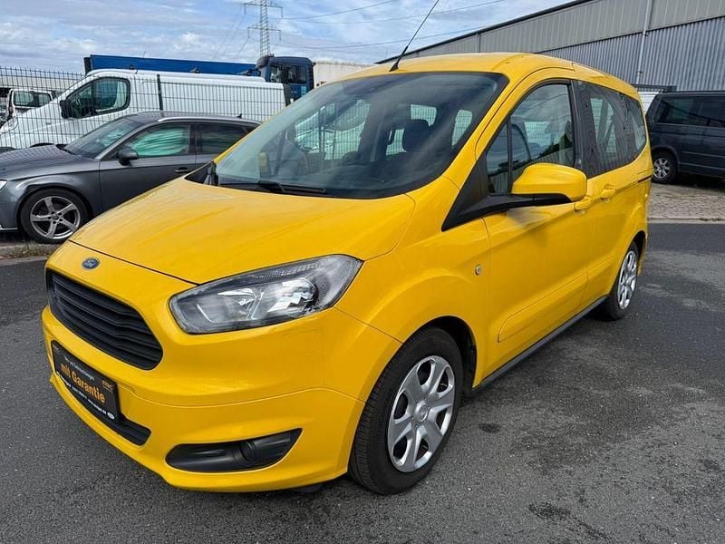 Gelb Gebraucht 2018 Ford Tourneo Courier Trend Van / Kleinbus | 5.400 € (Fairer Preis) - Bild 1/4
