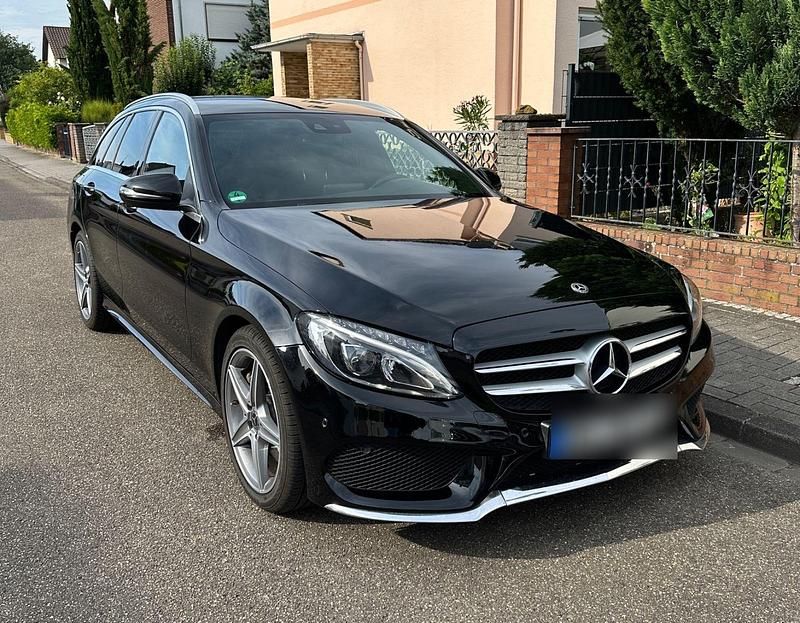 Schwarz Gebraucht 2017 Mercedes C250 AMG line Kombi | 15.500 € (Superpreis) - Bild 1/4