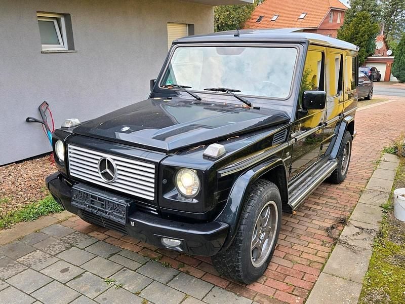 Schwarz Gebraucht 1999 Mercedes G500 AMG SUV | 24.000 € (Fairer Preis) - Bild 1/4