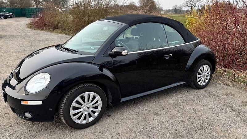 Gebraucht VW New Beetle 75 PS (55 kW) 2007 Schwarz Kleinwagen