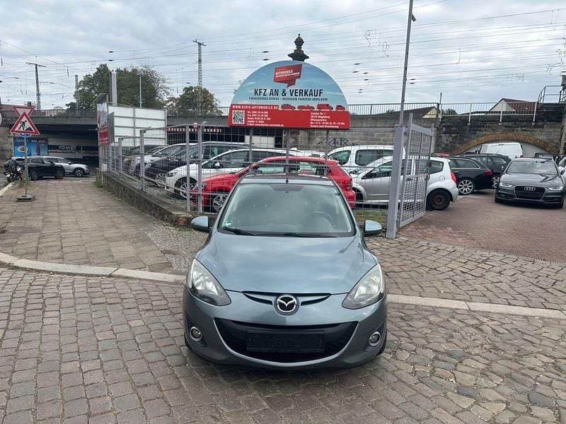Grau Gebraucht 2013 Mazda 2 Edition Kleinwagen | 4.490 € (Guter Preis) - Bild 1/4