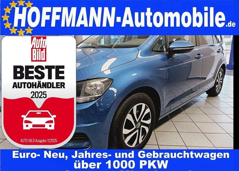 Caribbeanbluemet. Gebraucht 2021 VW Touran Comfortline Van / Kleinbus | 19.900 € (Superpreis) - Bild 1/4