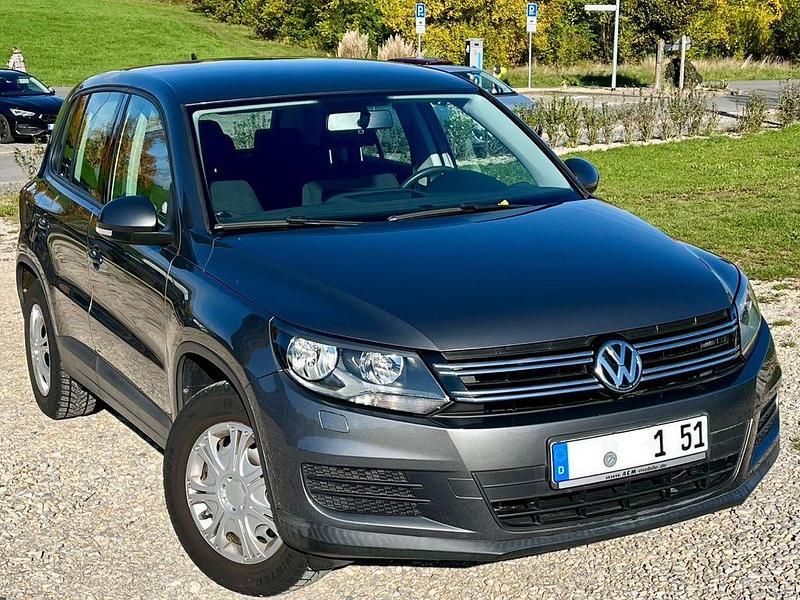 Grau Gebraucht 2014 VW Tiguan Sportline SUV | 9.500 € (Guter Preis) - Bild 1/4