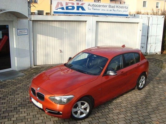 Gebraucht BMW 114 Sport Line 102 PS (75 kW) 2014 Orange Kleinwagen