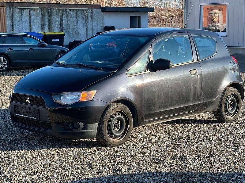 Astroschwarz (m) Gebraucht 2009 Mitsubishi Colt Inform Kleinwagen | 2.200 € (Fairer Preis) - Bild 1/4