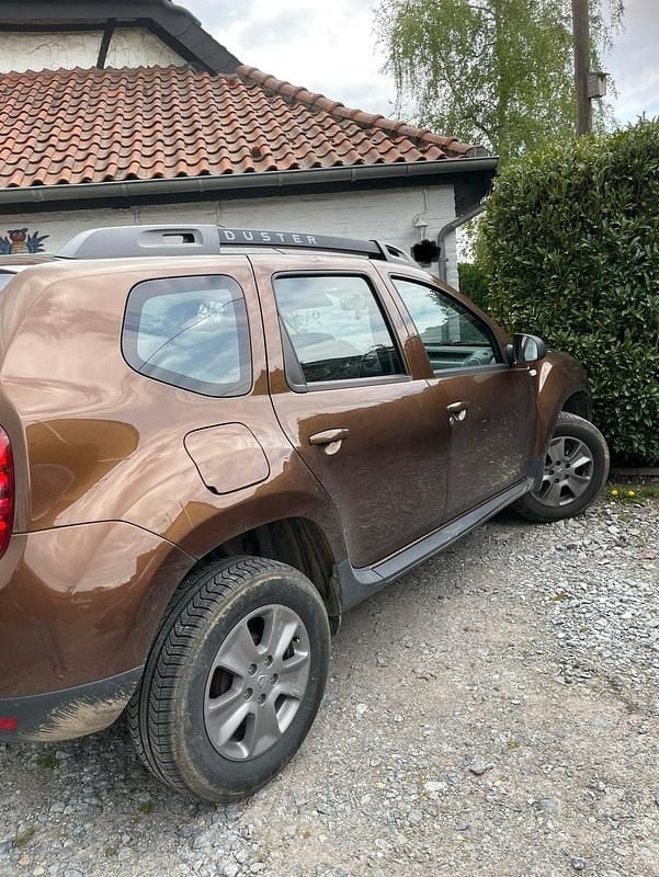Braun Gebraucht 2014 Dacia Duster SUV | 6.250 € - Bild 1/4