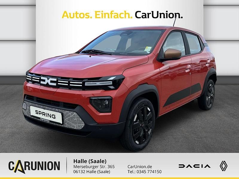 Brick red Neu 2025 Dacia Spring Extreme Kleinwagen | 14.995 € (Superpreis) - Bild 1/4
