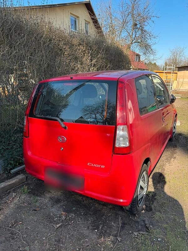 Gebraucht Daihatsu Cuore 59 PS (43 kW) 2003 Rot Kleinwagen