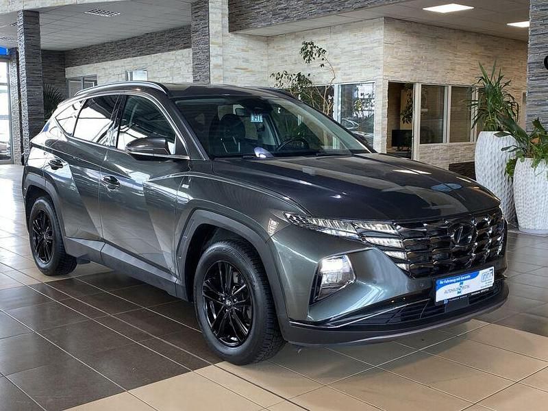 Grau amazon grey / met (metallic) Gebraucht 2021 Hyundai Tucson Prime SUV | 22.500 € (Fairer Preis) - Bild 1/4