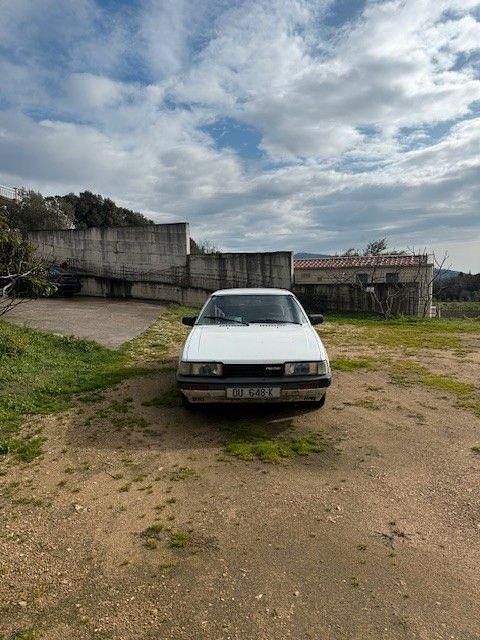 Second-hand Mazda 626 63 CP (46 kW) 1987 Alb Berlinǎ
