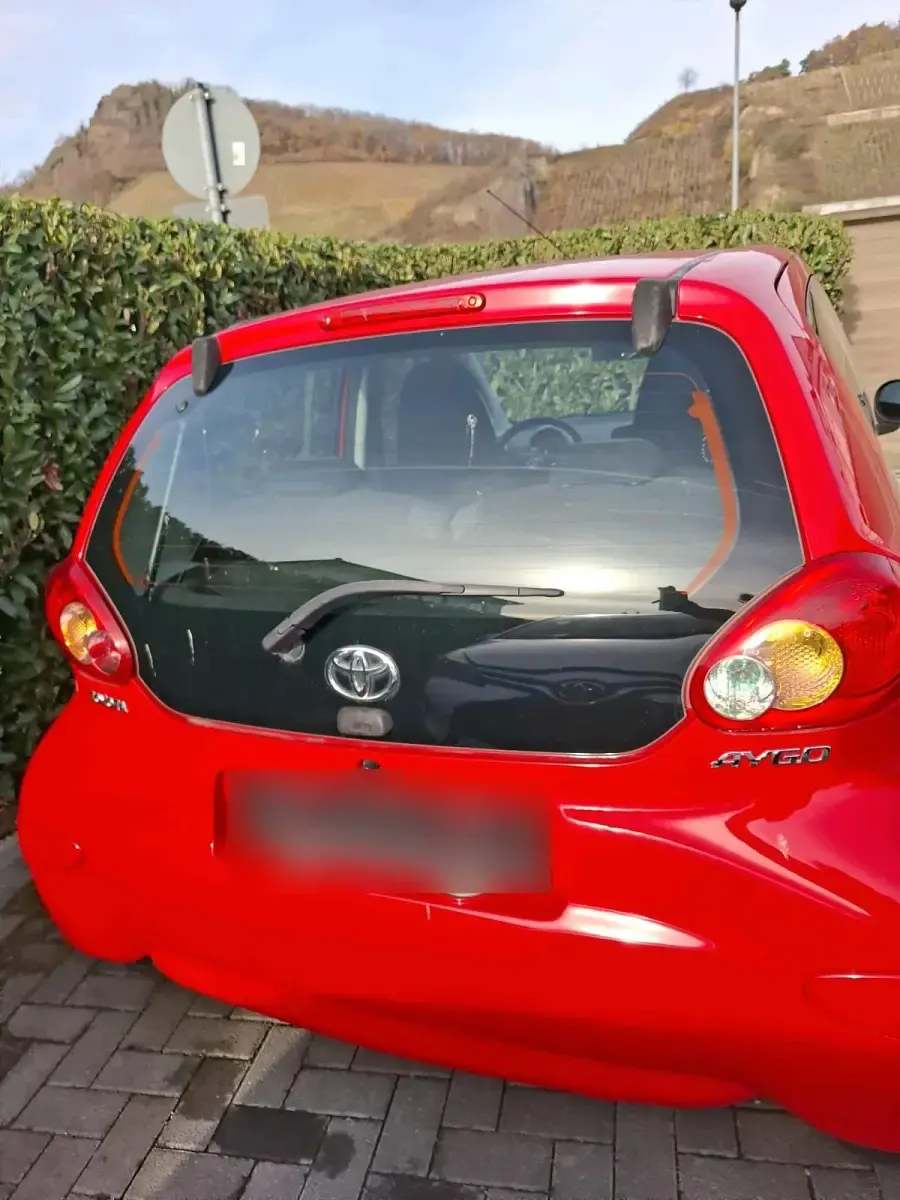 Gebraucht Toyota Aygo 68 PS (50 kW) 2007 Rot Kleinwagen