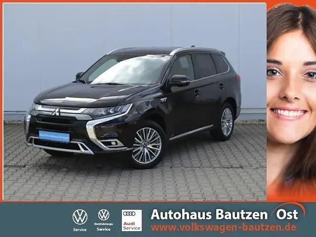 Rubinschwarz Gebraucht 2019 Mitsubishi Outlander P-HEV Top SUV | 22.440 € (Fairer Preis) - Bild 1/4