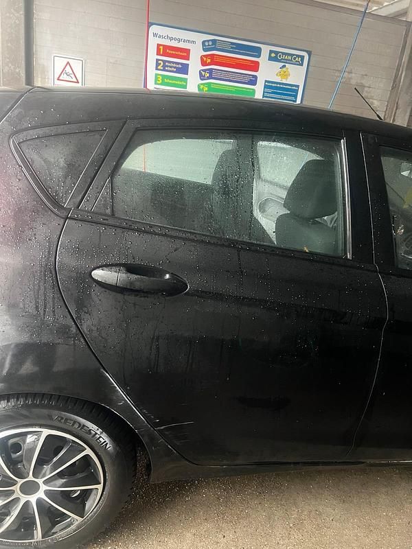 Gebraucht Ford Fiesta 71 PS (52 kW) 2011 Schwarz Kleinwagen