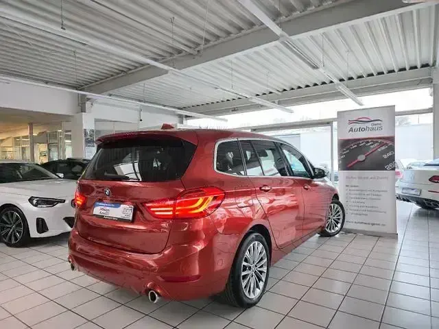 Gebraucht BMW 218 Gran Tourer Luxury Line 150 PS (110 kW) 2020 Orange Van / Kleinbus