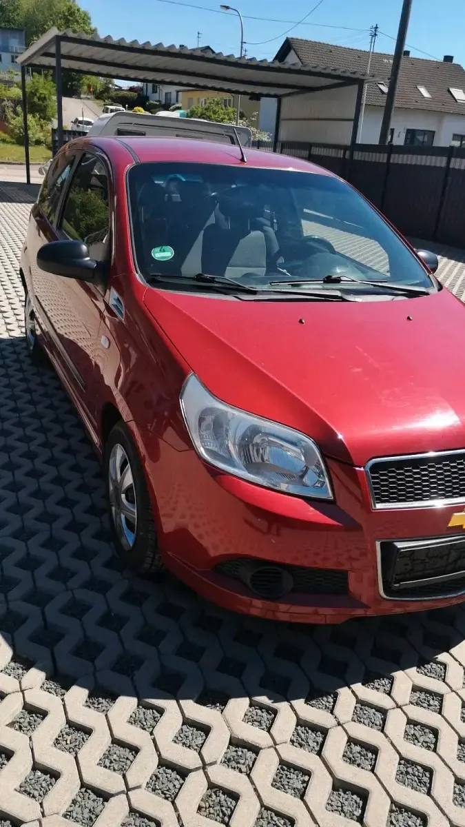 Używany Chevrolet Aveo 84 KM (61 kW) 2009 Czerwony Hatchback