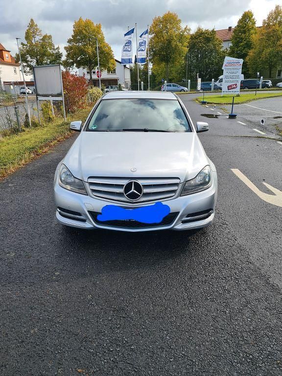 Silber Gebraucht 2012 Mercedes C180 Limousine | 6.600 € (Superpreis) - Bild 1/4