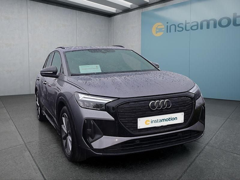 Grau Gebraucht 2022 Audi Q4 e-tron S-Line SUV | 30.699 € (Guter Preis) - Bild 1/4