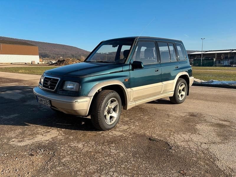 Grün Gebraucht 1997 Suzuki Vitara SUV | 2.400 € - Bild 1/4