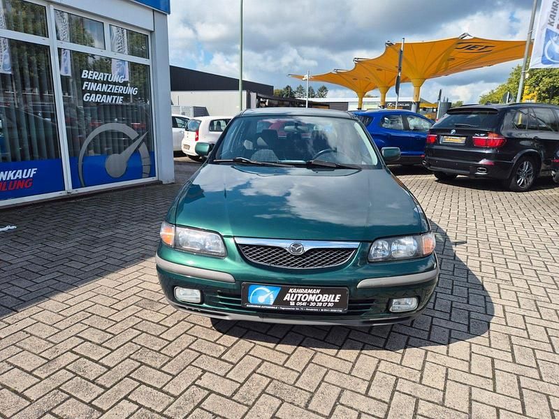 Grün Gebraucht 1998 Mazda 626 Comfort Limousine | 2.999 € - Bild 1/4
