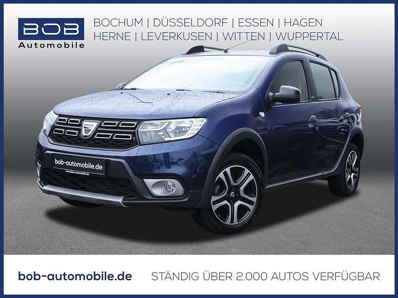 Blau Gebraucht 2019 Dacia Sandero Celebration SUV | 10.388 € (Fairer Preis) - Bild 1/3
