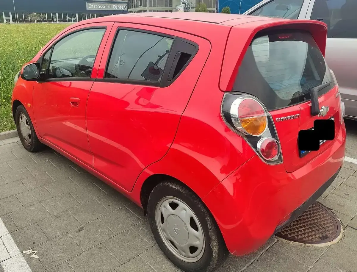 Second-hand Chevrolet Spark 68 CP (50 kW) 2011 Roșu Hatchback