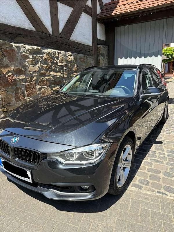 Schwarz Gebraucht 2017 BMW 320 Advantage Kombi | 16.900 € (Fairer Preis) - Bild 1/4