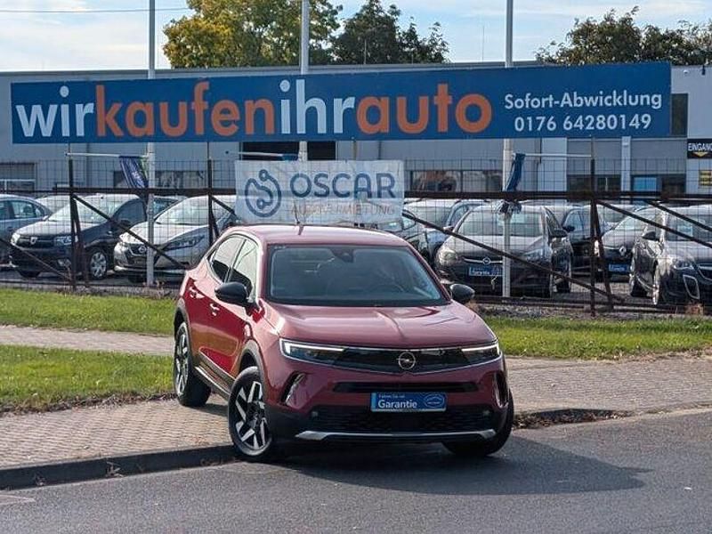 Gebraucht Opel Mokka Elegance 131 PS (96 kW) 2022 Power rot (metallic) SUV