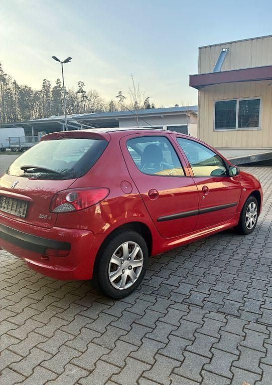 Gebraucht Peugeot 206+ 75 PS (55 kW) 2010 Rot Kleinwagen